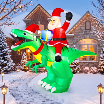 9FT Christmas Inflatables Santa Ride on Dinosaur with LED Outdoor Christmas Dinosaur Inflatable Blow Up Yard Decorations with Sandbags Stakes Strings for Garden Decor